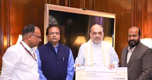 रेप्को बैंक ने शाह को 22 करोड़ रुपये से अधिक का लाभांश चेक दिया